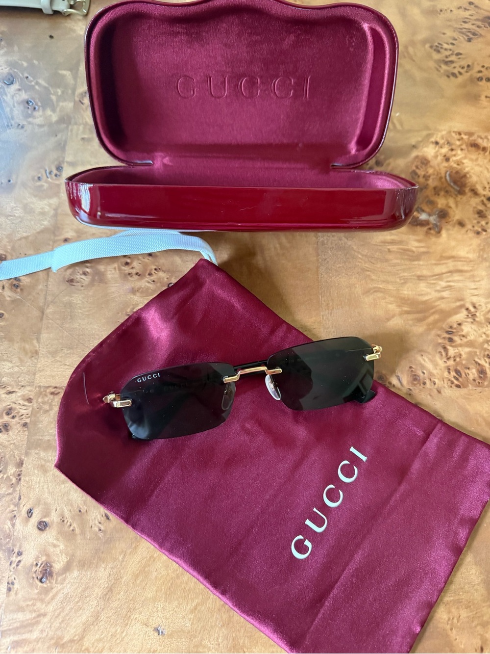 Gucci Rimless Sunglasses Black and Gold Accents